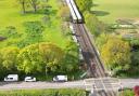 Passengers were evacuated from a train after it hit a level crossing barrier near Billingshurst this morning