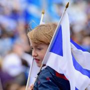 GLASGOW, SCOTLAND - SEPTEMBER 14:  Pro independence supporters march through Glasgow on route to the BBC Scotland where they staged a protest against their perceived bias on September 14, 2014 in Glasgow,Scotland. The latest polls in Scotland's