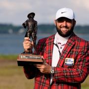 Scottie Scheffler holds the trophy after winning the RBC Heritage for his fourth win in five starts (Chris Carlson/AP)