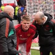 Scott McTominay looks in pain