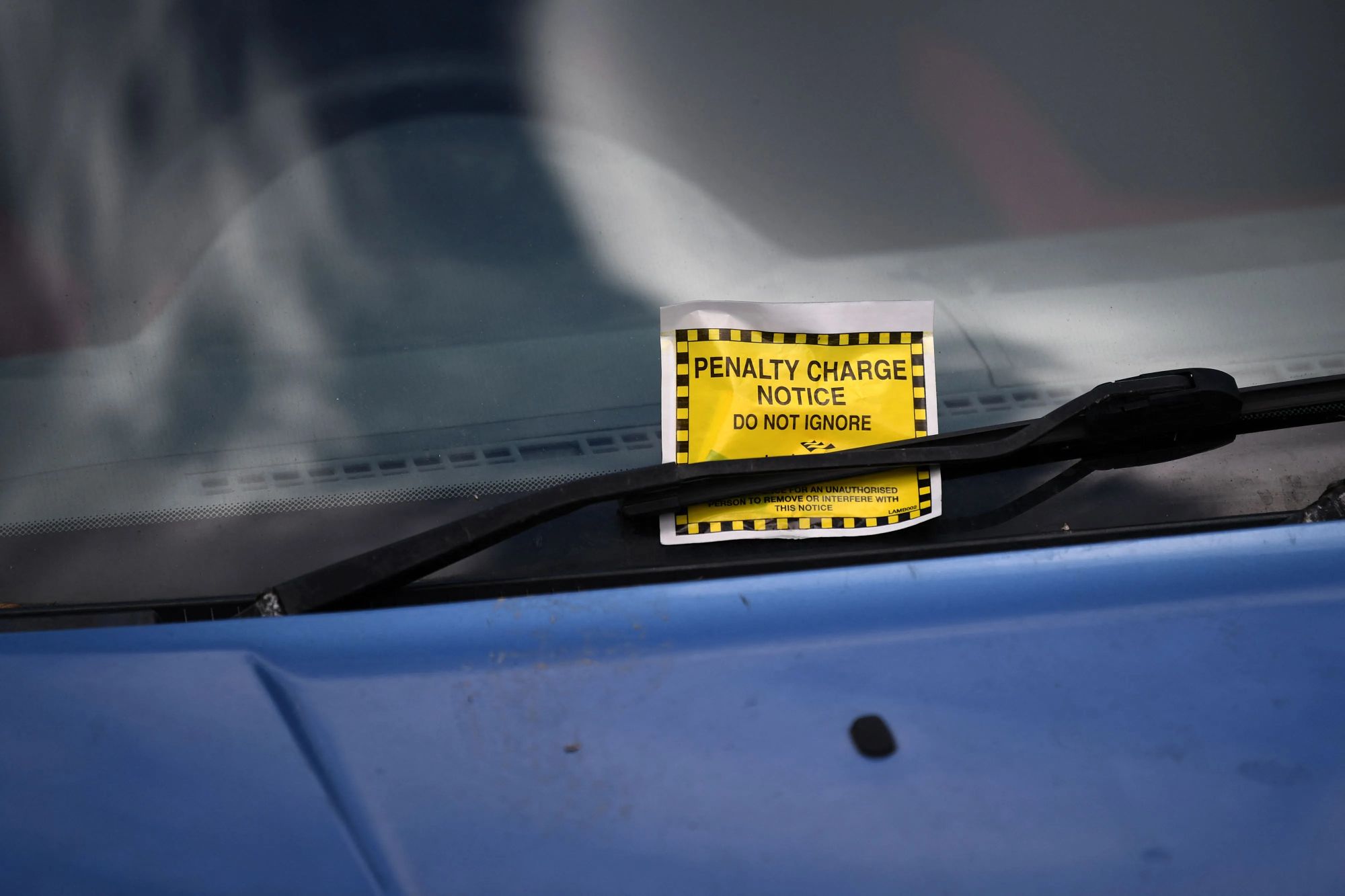 Drivers slapped with fake £120 fines outside homes - but big clue gives them away