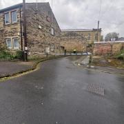 A police cordon on the snicket between Pleasant Street (foreground) and Great Horton Road