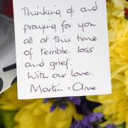 One of the tributes left at the scene of a tragic house fire on Kingsdale Drive in Bradford on Sunday morning.