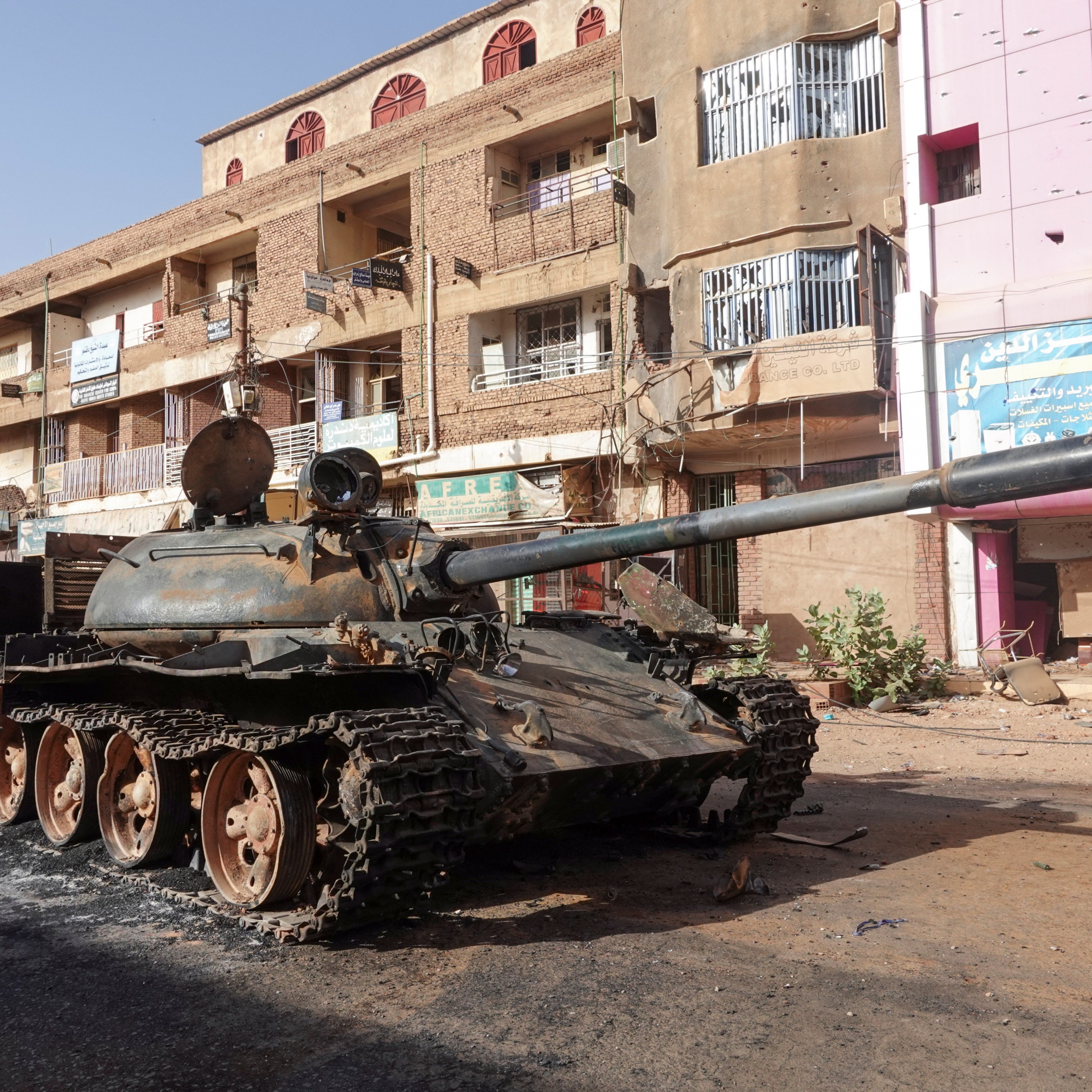 A damaged army tank in Omdurman, Sudan. One year since the conflict started, the military has ordered people to bury the dead in their yards and not to go to the cemeteries