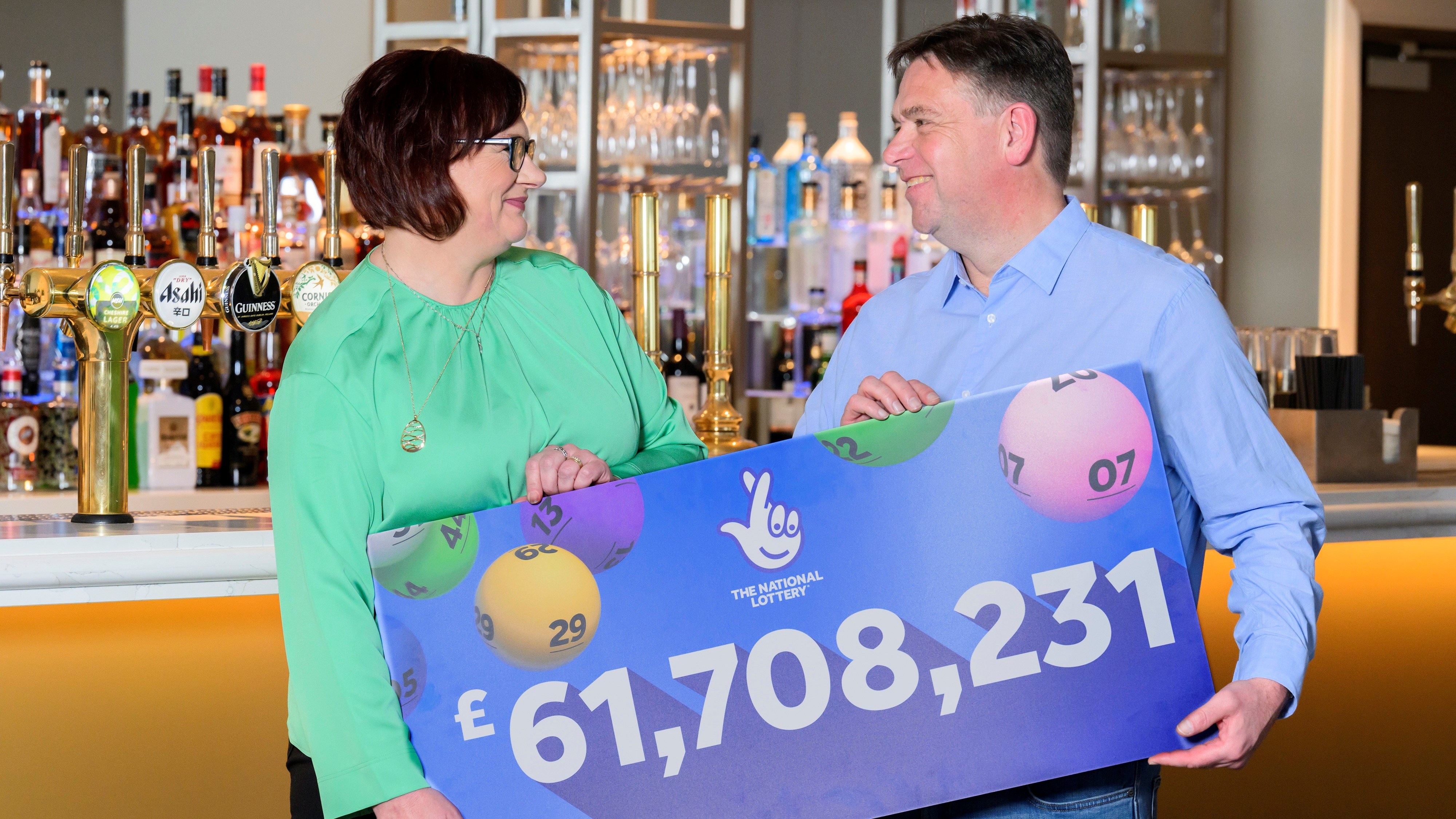 Richard and Debbie Nuttall from Colne, Lancashire, celebrate after landing more than £61 million in January