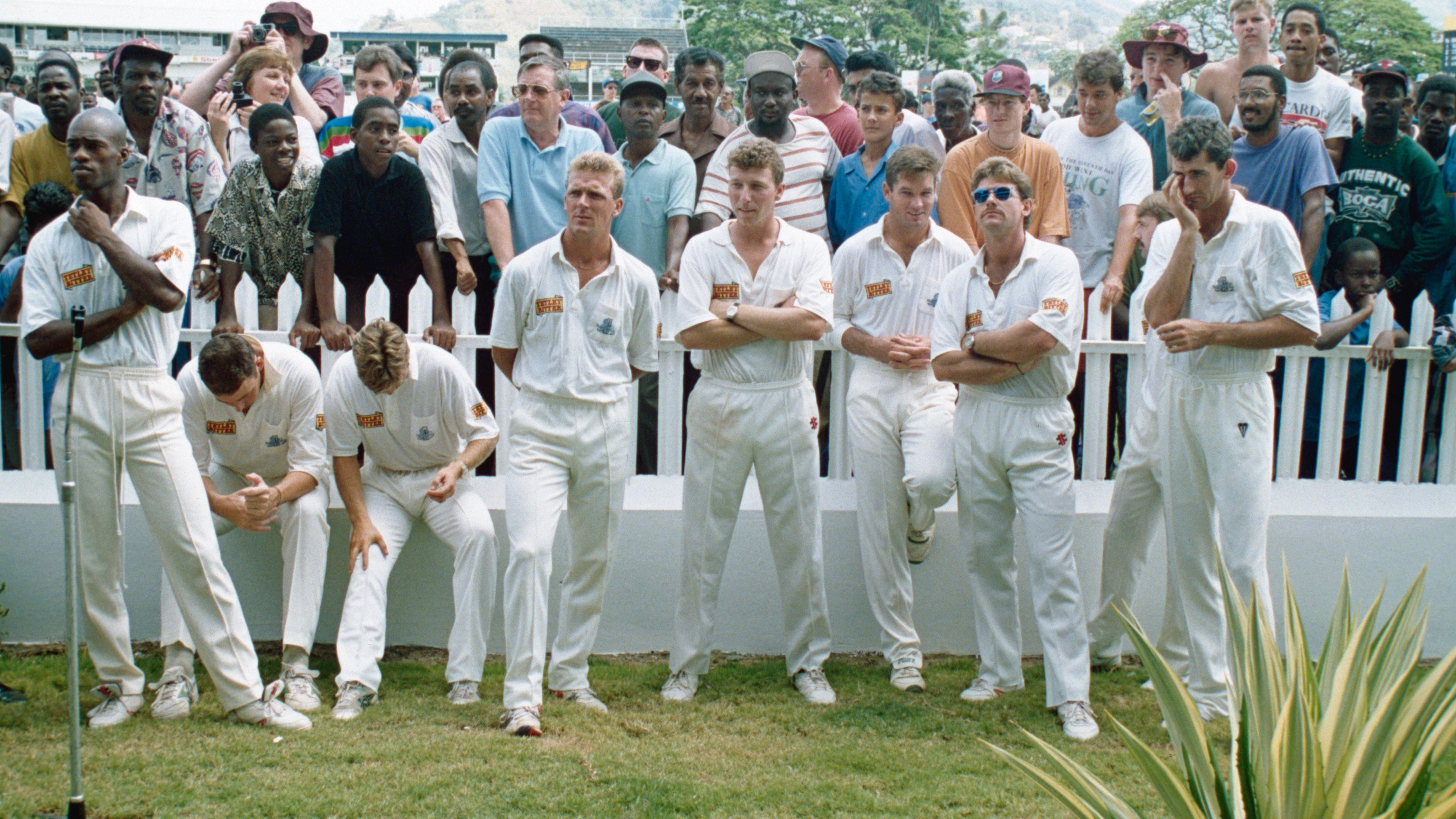 Atherton, centre, England’s young captain at the time, stands among dejected members of the team in Trinidad