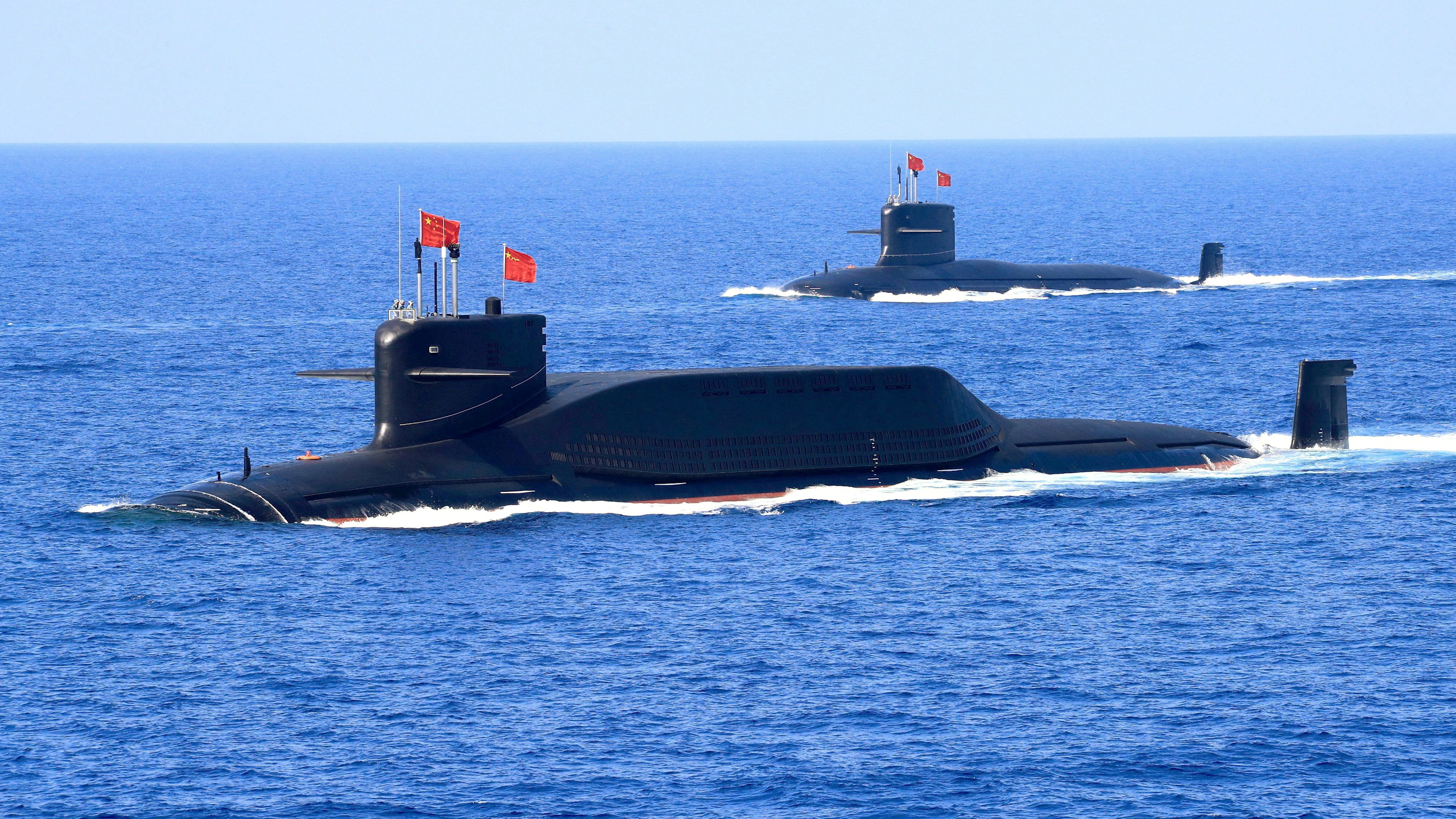 Jin class nuclear submarines of the People’s Liberation Army Navy during a military display in the South China Sea. The theoretical new vessels would be able to travel far faster using a submarine nuclear reactor