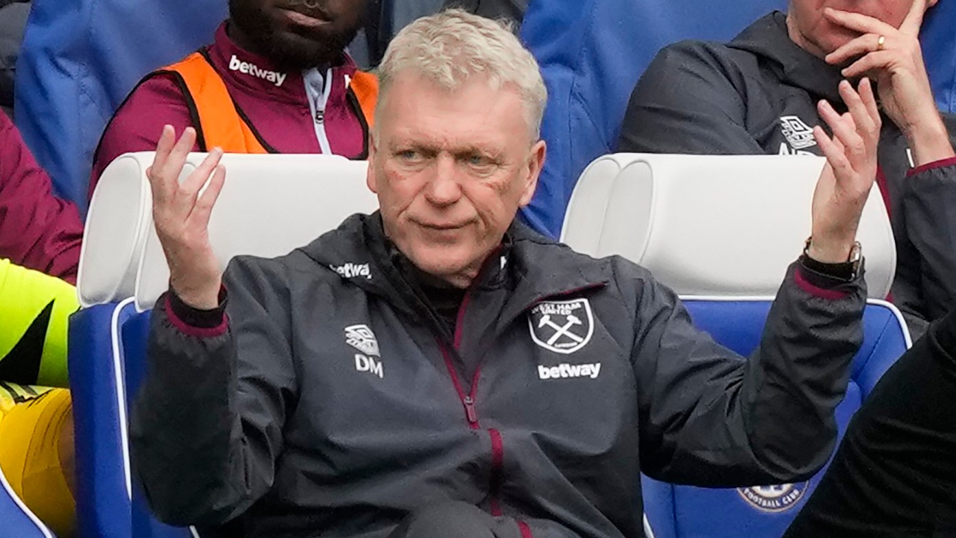 Moyes cuts a disconsolate figure on the bench at Stamford Bridge, where West Ham shipped another five goals against in-form Chelsea