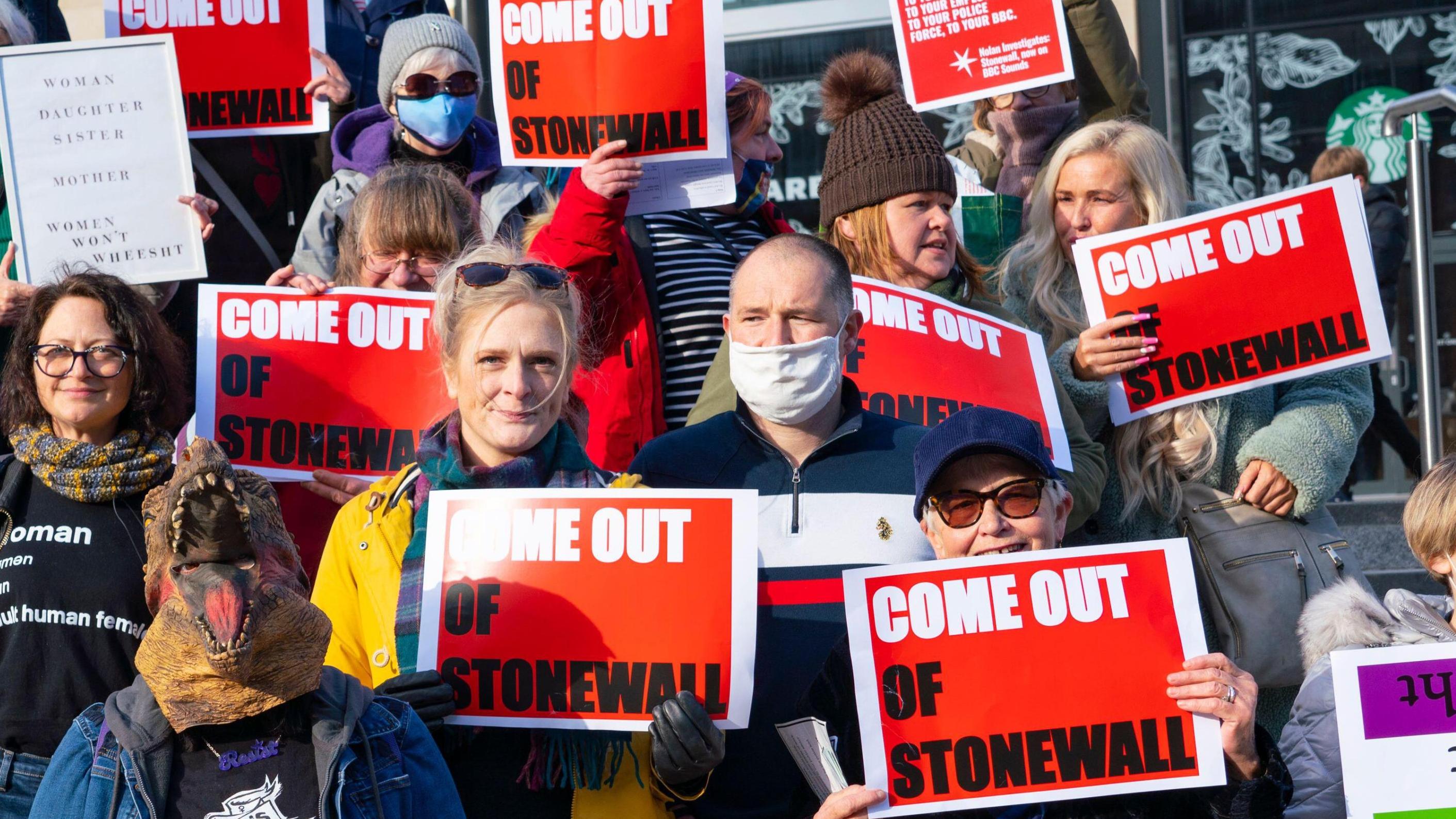 A group of demonstrators outside NHS Scotland offices in 2021, protesting against its involvement with Stonewall