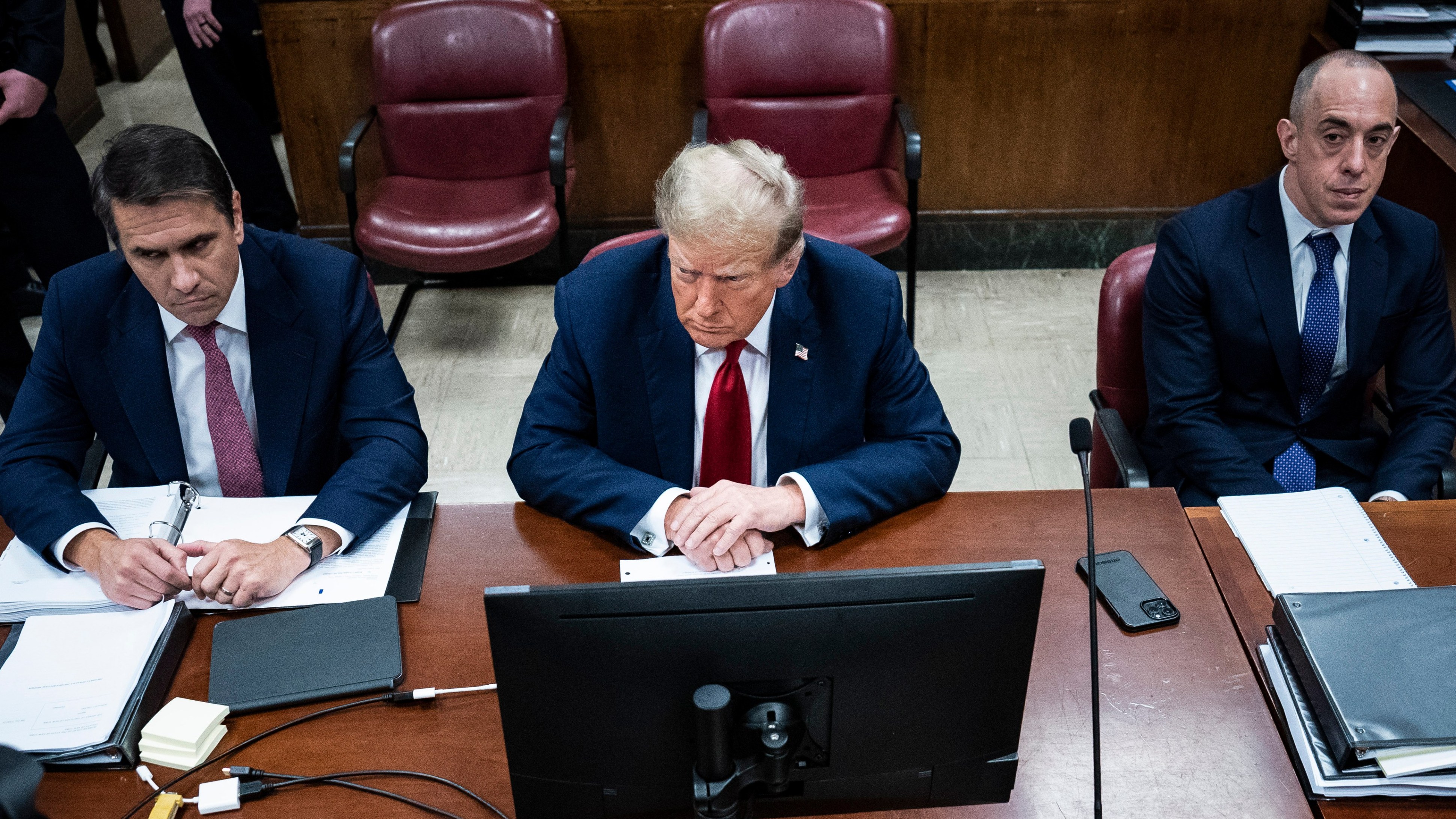 Donald Trump was flanked by his lawyers Todd Blanche, left, and Emil Bove