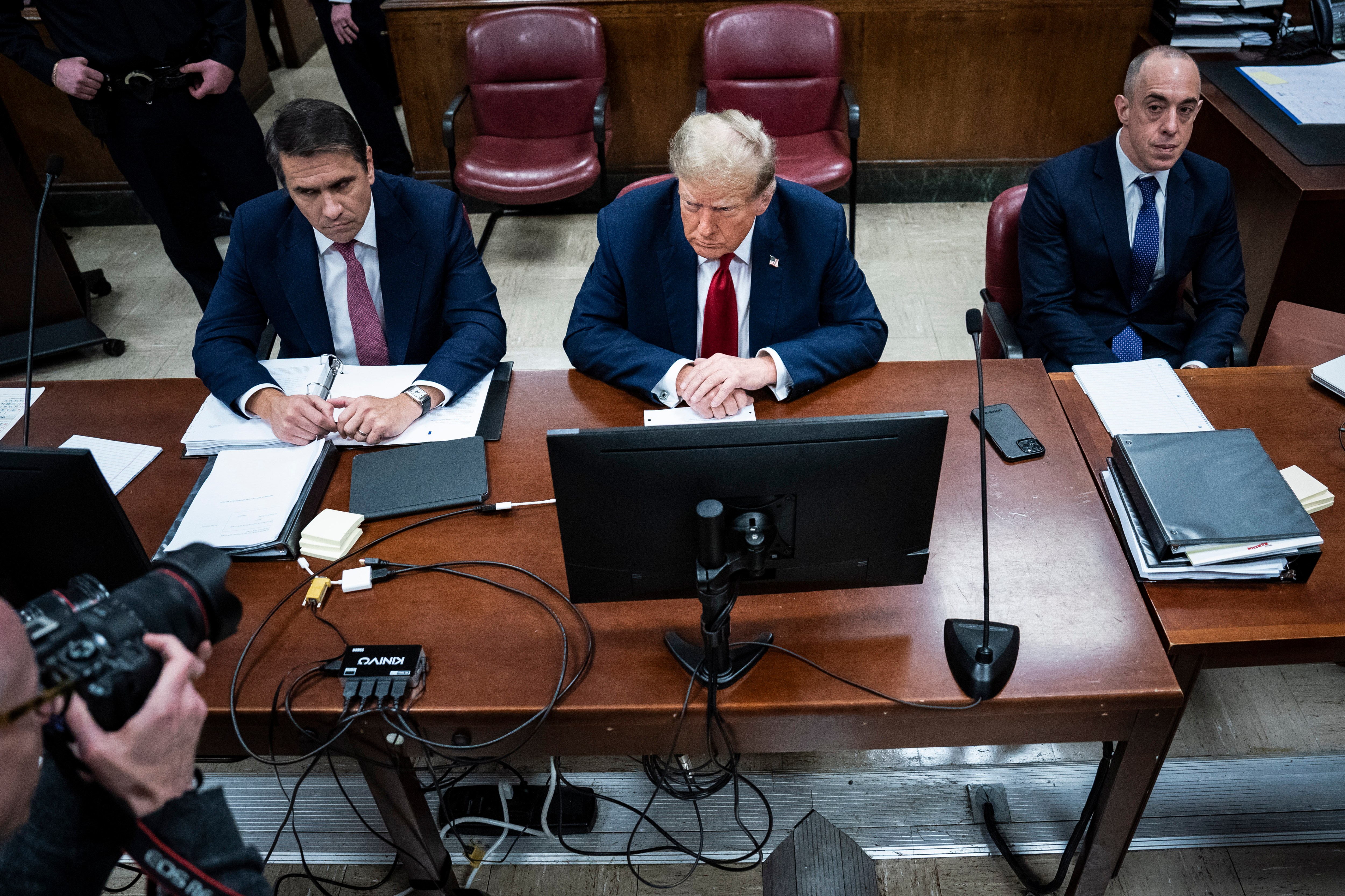 Donald Trump was flanked by his lawyers Todd Blanche, left, and Emil Bove