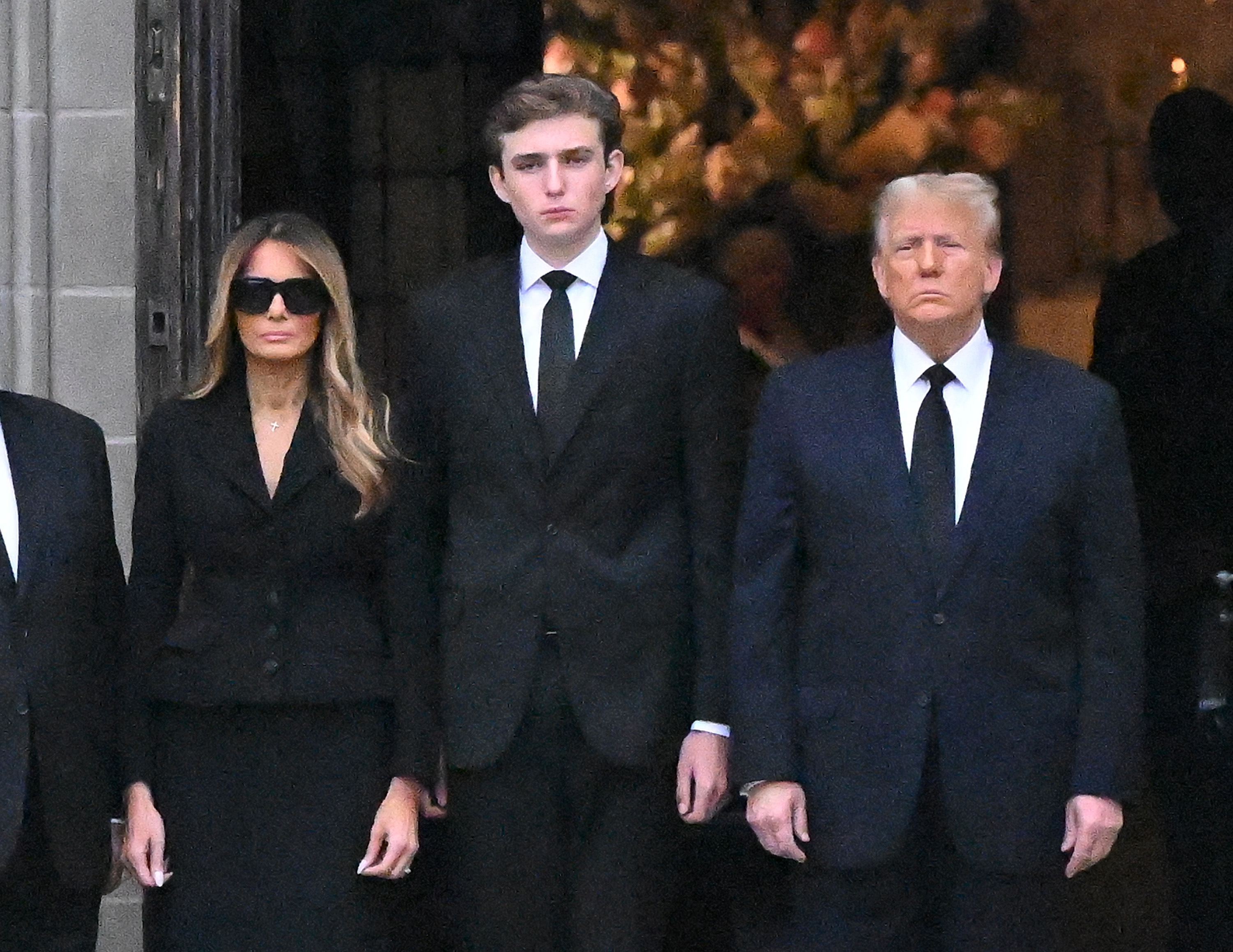 Melania, Barron and Donald Trump in January