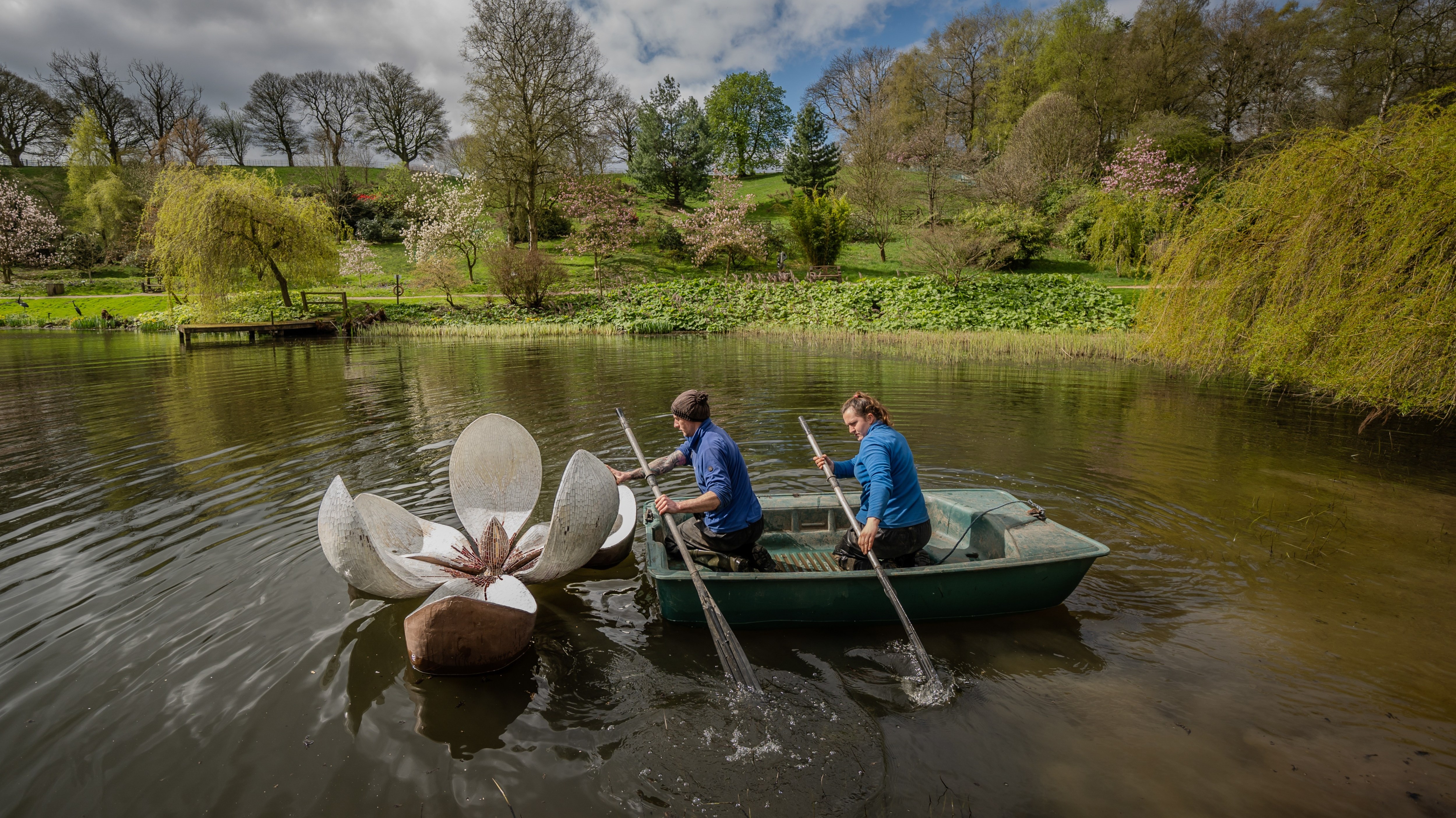 Gardeners install Magnolia, a sculpture by Rebecca Newnham, in a lake at the Himalayan Garden and Sculpture Park  near Ripon, North Yorkshire. The artwork is part of an exhibition in which 60 pieces will be dotted around the 45-acre garden