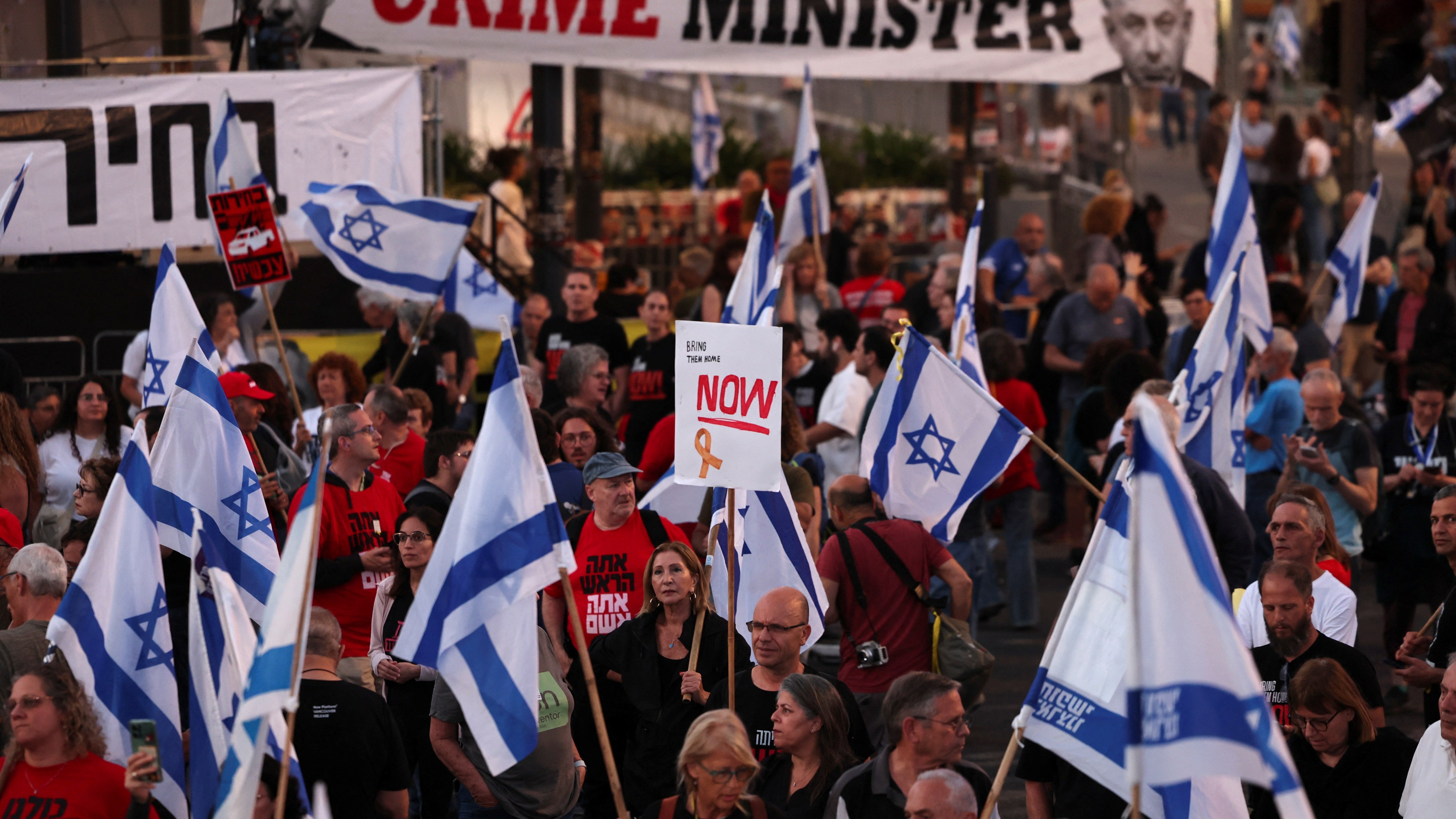 Anti-Netanyahu protesters demand the release of Israeli hostages held in Gaza at a march in Tel Aviv on Saturday