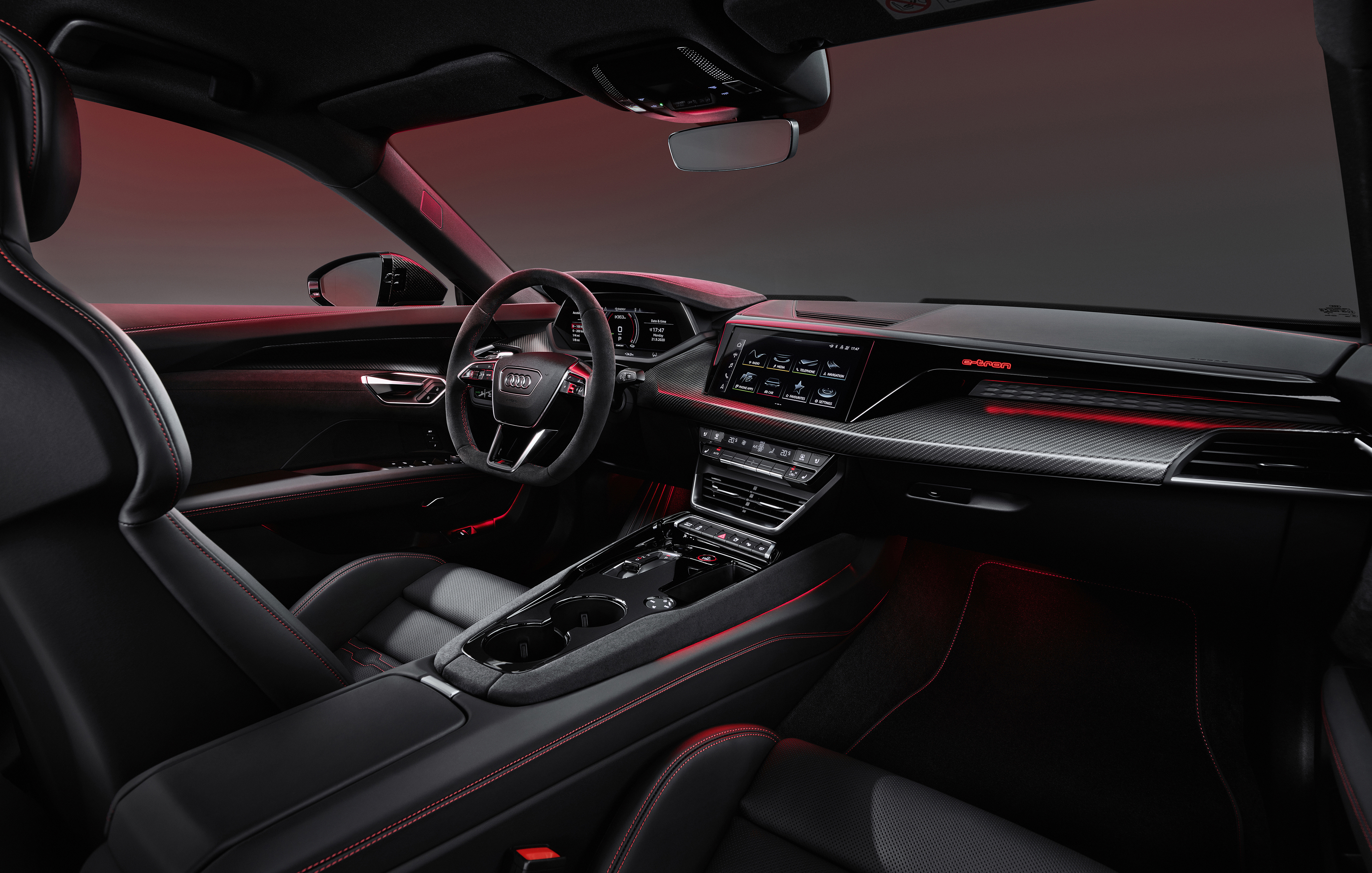 The interior of the Audi RS e-tron, featuring the low-slung driving position