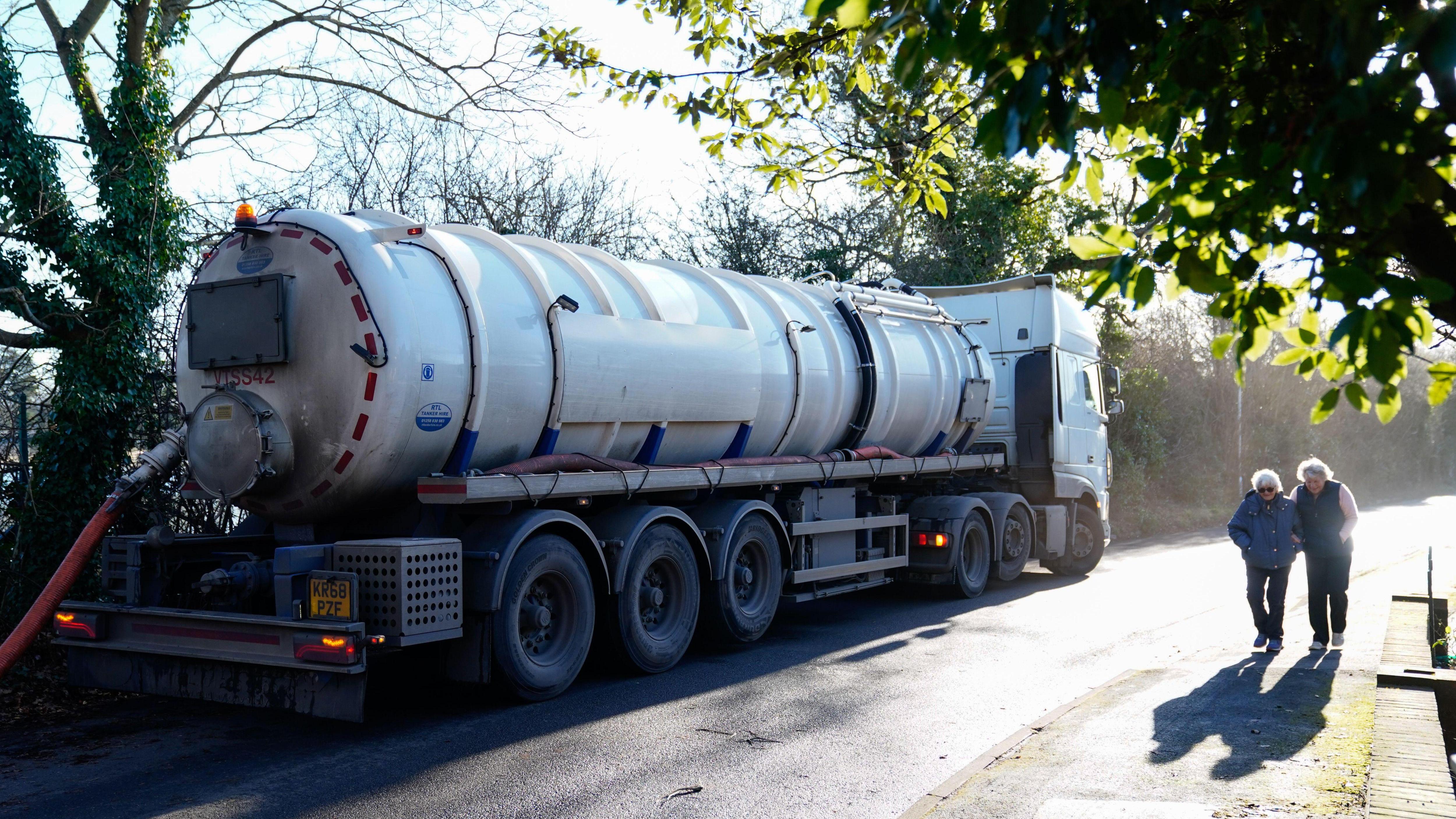 A tanker pumps sewage from the Lightlands Lane treatment station in Cookham, Berkshire. The vehicles are often used to transport sewage from overwhelmed treatment plants to others with more capacity