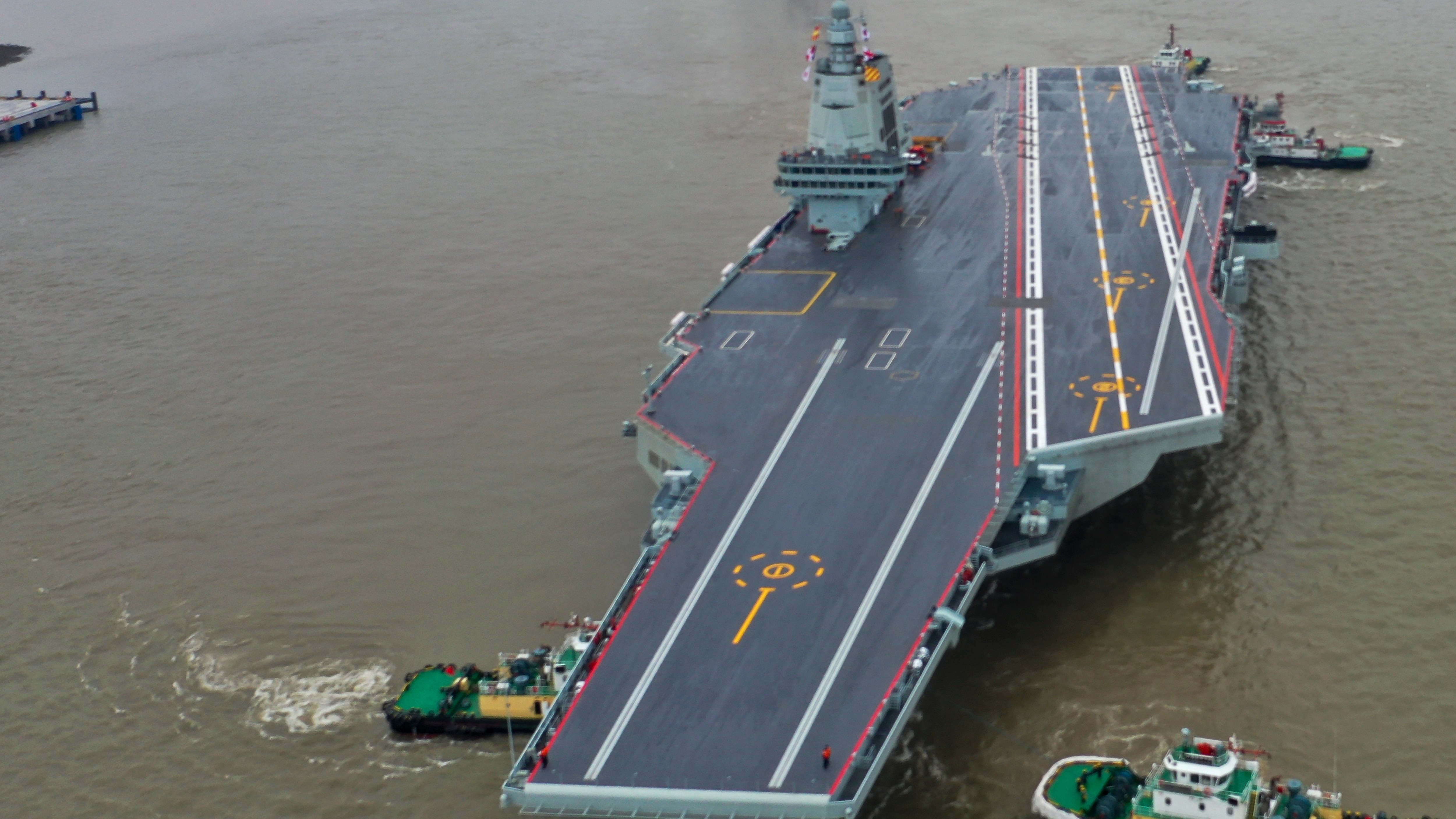 The Fujian leaves Jiangnan shipyard in Shanghai. It is expected to go into service next year