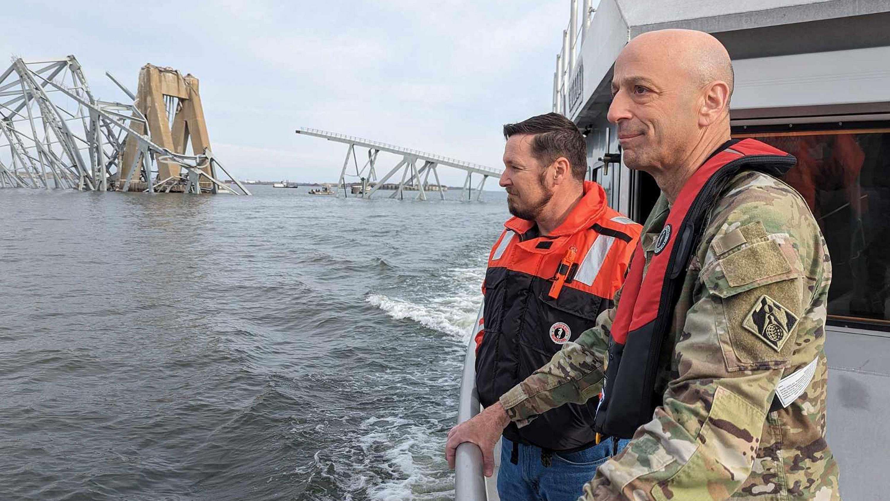 Lieutenant General Scott Spellmon of the US Army Corps of Engineers views the damage to the Francis Scott Key Bridge