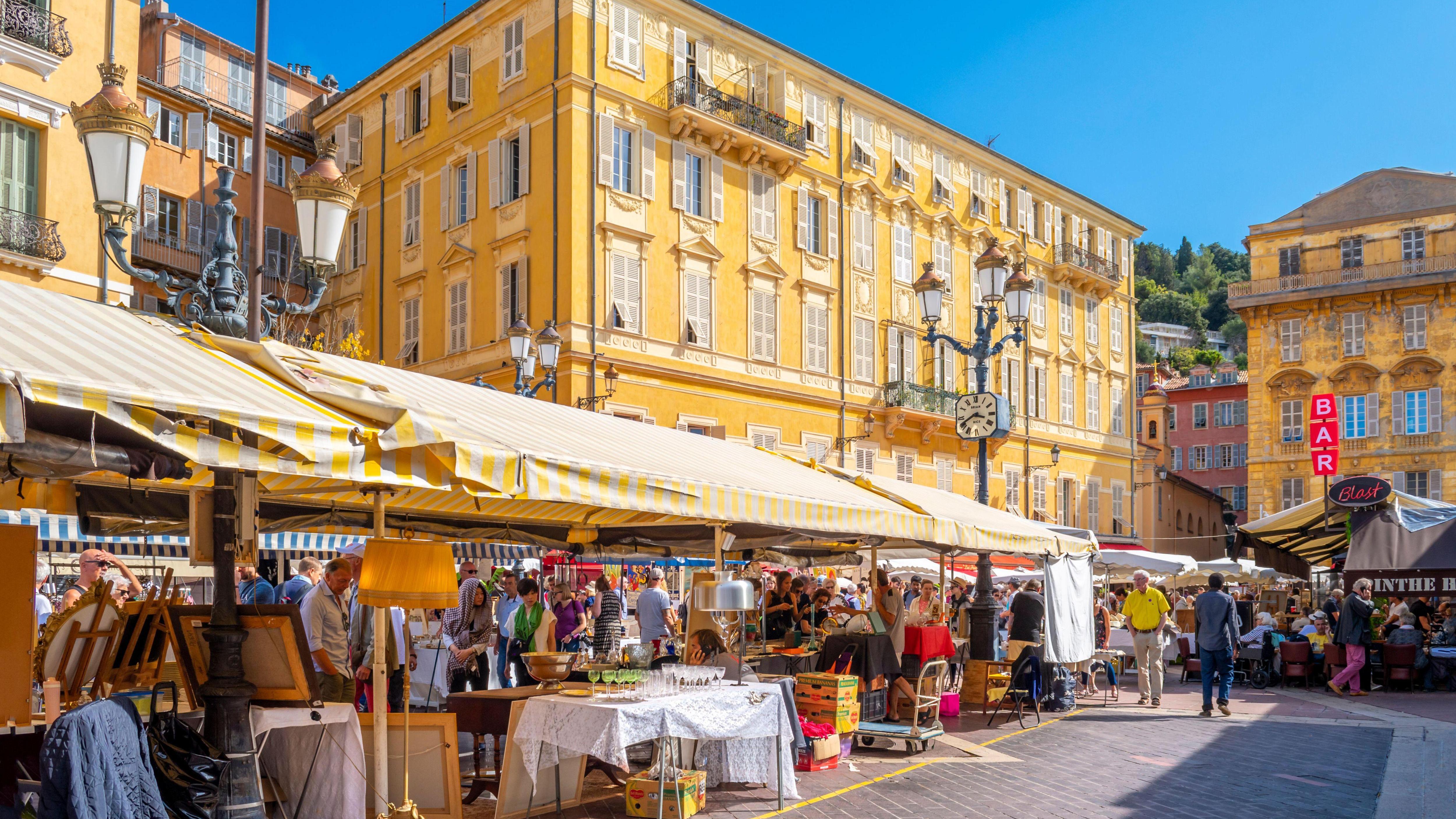 Tourists at Nice’s Cours Saleya flea market