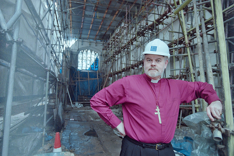 The RT Revd Richard Chartres pictured inside St Ethelburgas Church under restoration