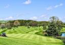 Head Greenkeeper Graham Kellett putting the finishing touches to the 18th hole at Kirkby Lonsdale Golf Club