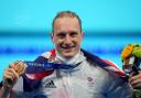 Luke Greenbank with his bronze medal (photo: PA)