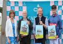 A winning team in Cartmel Races receiving sticky toffee pudding