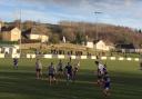 Action from Kendal Town's match against Glossop