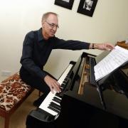 During the Levens Choir concert accompanist Ken Forster (pictured) performed two of Czech composer Janacek's piano pieces. Picture: Jon Granger