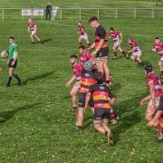 The towering presence of of Kirkby's James weeks provides a clean feed to scrum half Charlie Oats (Robin Ree)