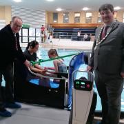 Alexander Scott, HM Lord-Lieutenant of Cumbria, Councillor Matt Severn, chair of Westmorland and Furness Council, Grace, a pupil at Sandgate School, and teaching assistant Harli Berry