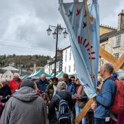 The precession making its way through the market place