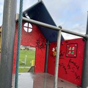 Graffiti tags cover play equipment in Sandylands