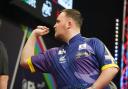 Luke Littler in action during his win over Damon Heta at the Austrian Darts Open