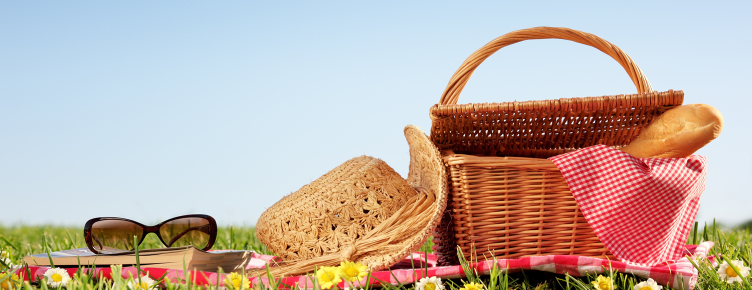 Picnic basket, hat and sunglasses