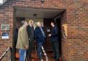 Dr Keiron Redman (right) shows Llyr Gruffydd MS, Dyfed Edwards (chair BCUHB), , Dr Bill Whitehead and Geoff Ryall-Harvey of Llais around Hanmer Surgery.