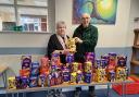 Shropshire councillor Peggy Mullock oversees the donation to Alan Strutt.