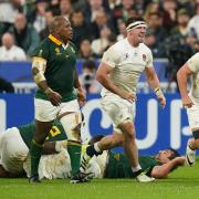 Tom Curry and South Africa hooker Mbongeni Mbonambi. PA.