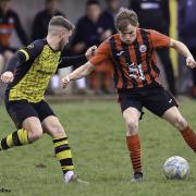 Action from Wem Town's win at St Martins.