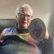 MISSED: Lorraine James holds a photo of her late husband Bryan John James (known as John James) who was immortalised in one of the memorial bricks at New Road, home of Worcestershire County Cricket Club