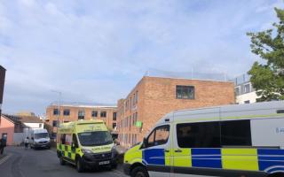 Emergency services outside the Worcester Job Centre.