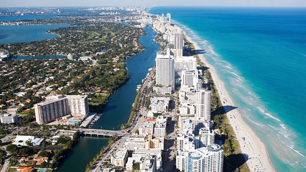 Like other popular areas including Sunny Isles and Hollywood Beach, Miami Beach is a narrow barrier island with the ocean on one side (Credit: Alamy)