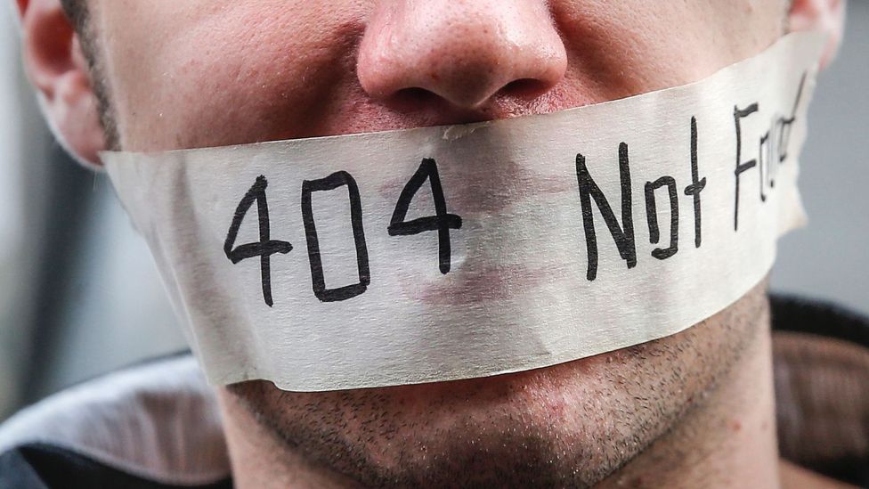 Man with 404 error sticker on mouth (Credit: Getty Images)