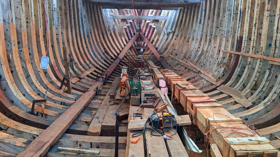 A wooden skeleton shows the hull of a ship under construction (Credit: Jocelyn Timperley)