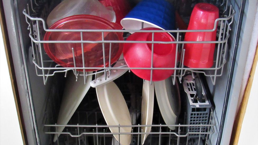 Plastic and plates in dishwasher (Credit: D Homer/Getty Images)
