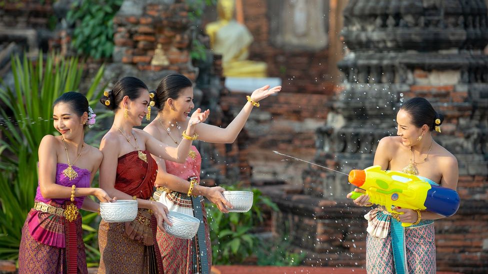 Women in Thailand celebrate Songkran with water fights (Credit: Chadchai Ra-ngubpai/Getty Images)